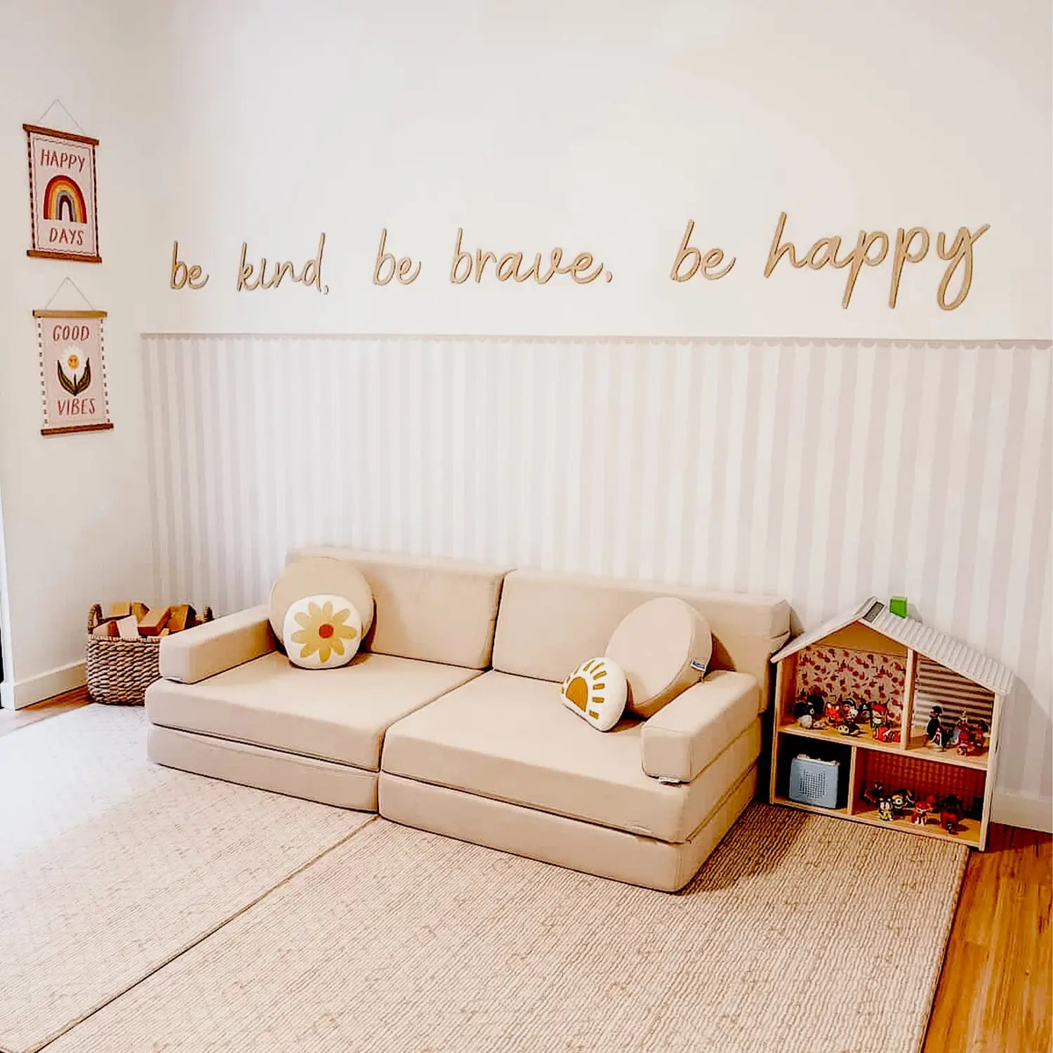 Neutral kids room with inspirational wall text and natural textures