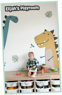 A child’s playroom with dinosaur wall decals and toy storage.
