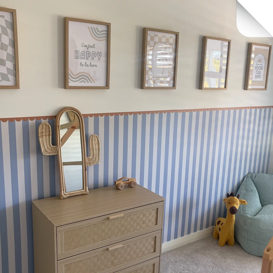 A light wood dresser with three drawers, each featuring a woven pattern on the front.